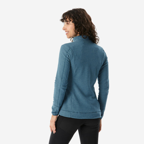 A photo of the Quechua Women's MH120 Fleece Jacket in use